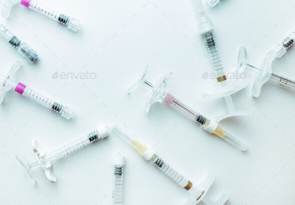 empty syringes with hyaluronic acid. Cosmetology and contour plastic concept