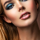 Photo of young woman with style make-up. Portrait of blonde woman with a beautiful face. Closeup - PhotoDune Item for Sale