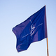 NATO flag.North Atlantic Treaty Organization flag waving. - PhotoDune Item for Sale