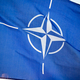 NATO flag.North Atlantic Treaty Organization flag waving. - PhotoDune Item for Sale