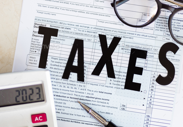Individual income tax return form for tax payment on working desk. Calculation tax return in 2023 - Stock Photo - Images