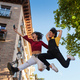 Two teenager girls jumping and taking selfie. - PhotoDune Item for Sale
