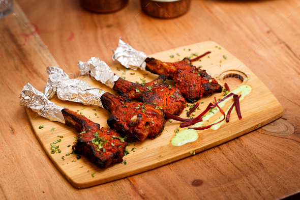 Grilled Lamb Lollipop Chops With Green Goddess Dipping Sauce Stock ...