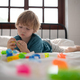Little boy in his bedroom with a new toy purchased by his parents - PhotoDune Item for Sale