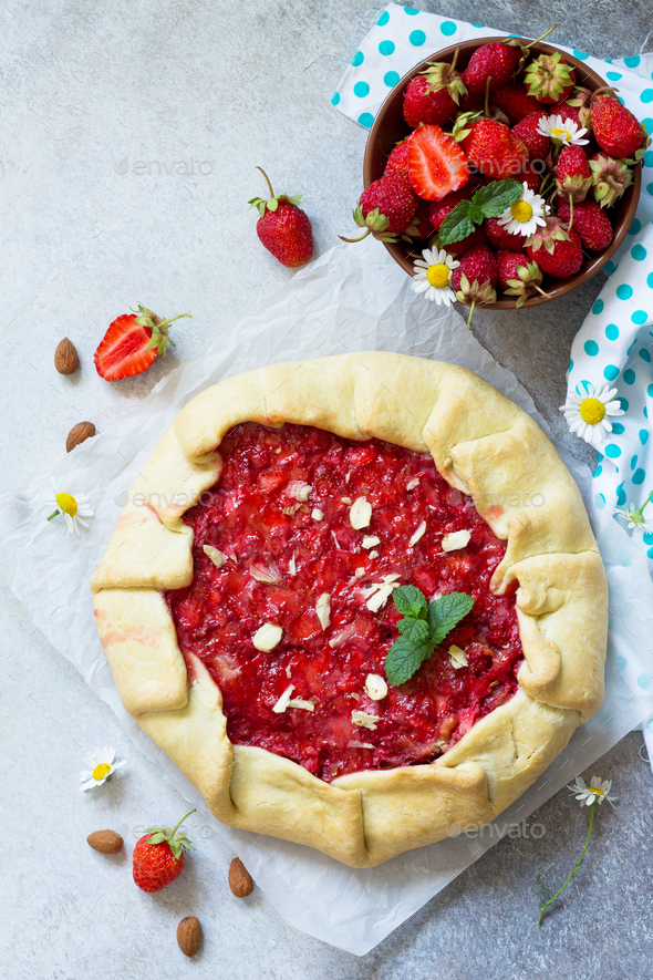Fresh homemade strawberries galette with nut cream.  - Stock Photo - Images