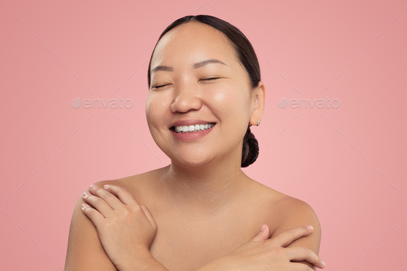 Natural charming Asian woman with clean skin - Stock Photo - Images