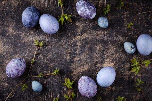 Festive Easter eggs in purple and blue color - Stock Photo - Images
