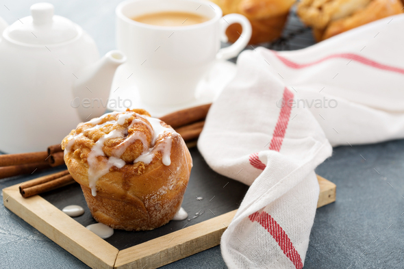 Cinnamon bun with glaze for breakfast