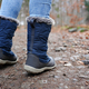 Rear view of traveler in hiking boots - PhotoDune Item for Sale