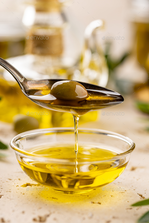 Green olive in spoon - Stock Photo - Images