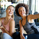 Beautiful women working out in gym together to stay healthy. Sport, people, friend concept. - PhotoDune Item for Sale