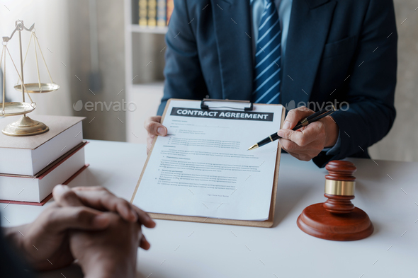 Lawyer enter into contract with debtor to mediate in lawsuit. - Stock Photo - Images