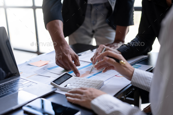 Business people are meeting show business growth to plan new business expansion in the future. - Stock Photo - Images