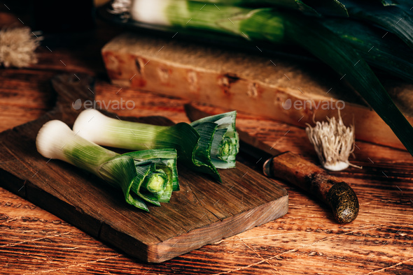 Fresh green leek on cutting board - Stock Photo - Images