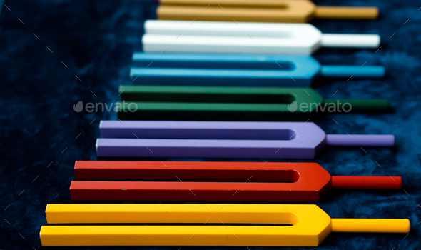 Set of colorful tuning forks - tools sound healing - Stock Photo - Images