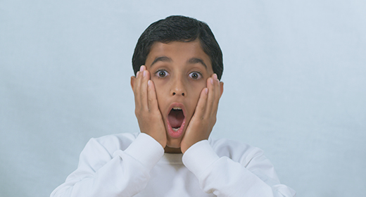 The boy shows up with different emotional faces