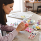 Woman making Easter decorations at home - PhotoDune Item for Sale