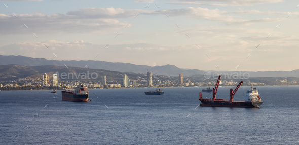Ships at the Port and Modern Cityscape on the Sea Coast. Limassol, Cyprus - Stock Photo - Images