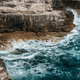 Stunning scenery of sea waves splashing against rocky cliffs - PhotoDune Item for Sale