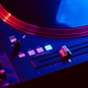 Close up of DJ mixing console in party light - PhotoDune Item for Sale