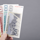 Old Slovenian money in the hand on a gray background - PhotoDune Item for Sale