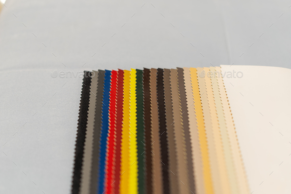 Catalog of multicolored imitation leather from matting fabric texture background - Stock Photo - Images