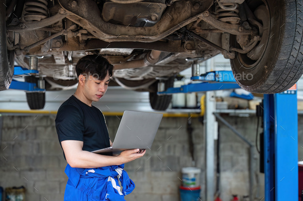 car service, repair, maintenance and people concept - happy smiling auto mechanic man or smith with - Stock Photo - Images