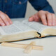 Christian catholic man concentrate on reading Holy Bible at home. Sunday readings. - PhotoDune Item for Sale
