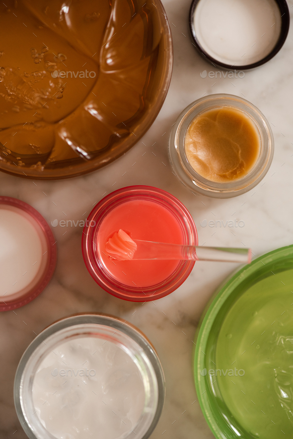 Skin care products on bathroom table close up top view - Stock Photo - Images