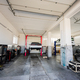 Muscle car at service repair station in lift. - PhotoDune Item for Sale