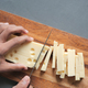 cutting cheese with knife on a chipping board  - PhotoDune Item for Sale