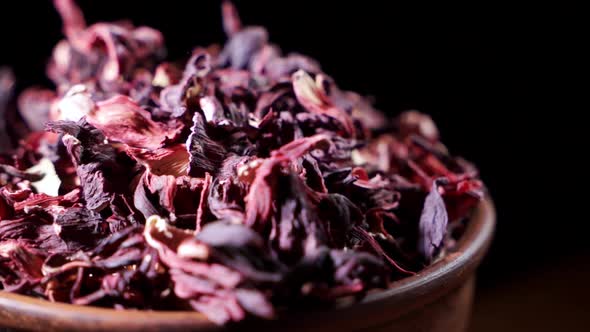 Large Leaves of Hibiscus Red Dry Tea Background, Close Up. Loop Rotation. alt