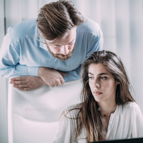 Pressure at Work. Boss Pressures New Female Worker. - Stock Photo - Images