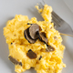 Scrambled eggs with fresh black truffles from Italy served in a plate close up, gourmet breakfast - PhotoDune Item for Sale
