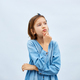 Thoughtful teen girl child wearing jeans dress with finger thinking - PhotoDune Item for Sale