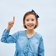 Teen girl child wearing jeans dress make finger up - PhotoDune Item for Sale