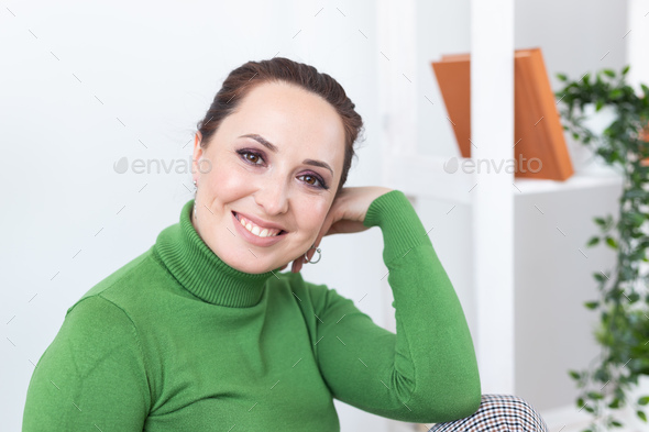 Happy emotions woman relaxing on chair at home in sitting room copy space and empty place for text - - Stock Photo - Images