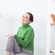 Happy emotions woman relaxing on chair at home in sitting room copy space and empty place for text - - PhotoDune Item for Sale