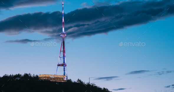 Tbilisi, Georgia. Night Scenic View Of Georgia Tbilisi Tv Broadcasting Tower. Located On Territory - Stock Photo - Images