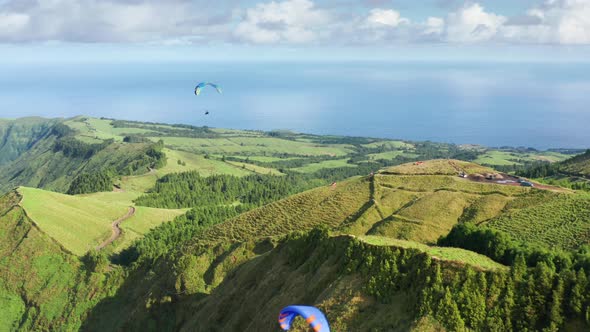 Paragliders Flying in Sky at Miradouro Do Cerrado Das Freiras Sao Miguel Island alt