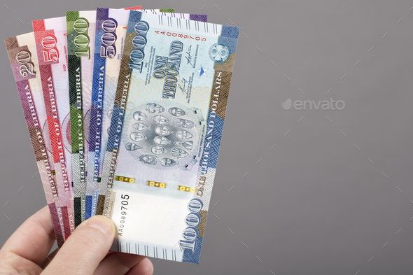 Liberian dollar - new series of banknotes on a gray background - Stock Photo - Images