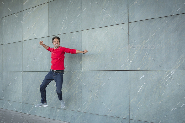 Active Man Jumping For Joy, Cheering Stock Photo By Westend61 