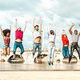 Diverse multi racial friends jumping at Rimini city - PhotoDune Item for Sale
