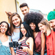 Multi racial friends taking video selfie with mobile phone on stabilize gimbal - PhotoDune Item for Sale
