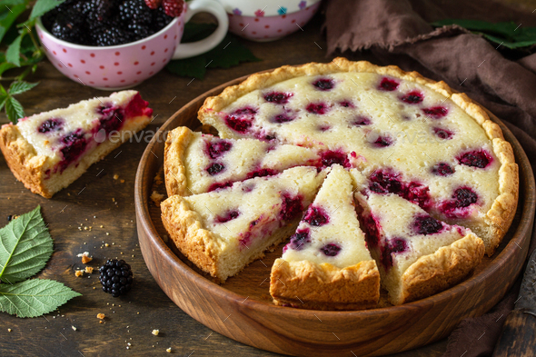 Homemade blackberry pie. Sweet pie with blackberry on rustic wooden table. - Stock Photo - Images