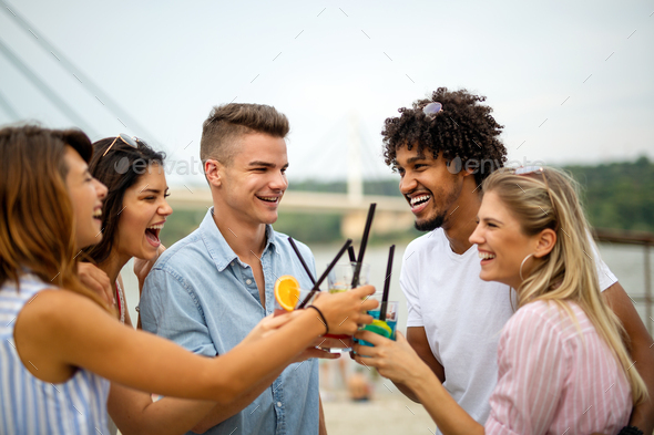 Summer joy and friendship concept with young people on vacation. People happiness concept. - Stock Photo - Images