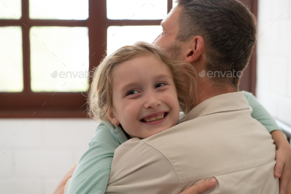 A little girl expresses his feelings for his father. - Stock Photo - Images