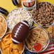 Top view of snacks for watching a football game. Super Bowl or Playoff concept on yellow background. - PhotoDune Item for Sale