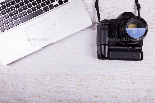 Over top photo of camera and laptop Stock Photo by DC_Studio | PhotoDune