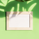Empty picture frame with shadow of tropical green leave on color background - PhotoDune Item for Sale